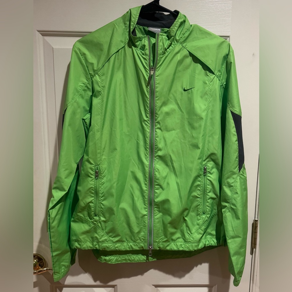 NWOT Nike lightweight running jacket in lime green with dark grey accent…